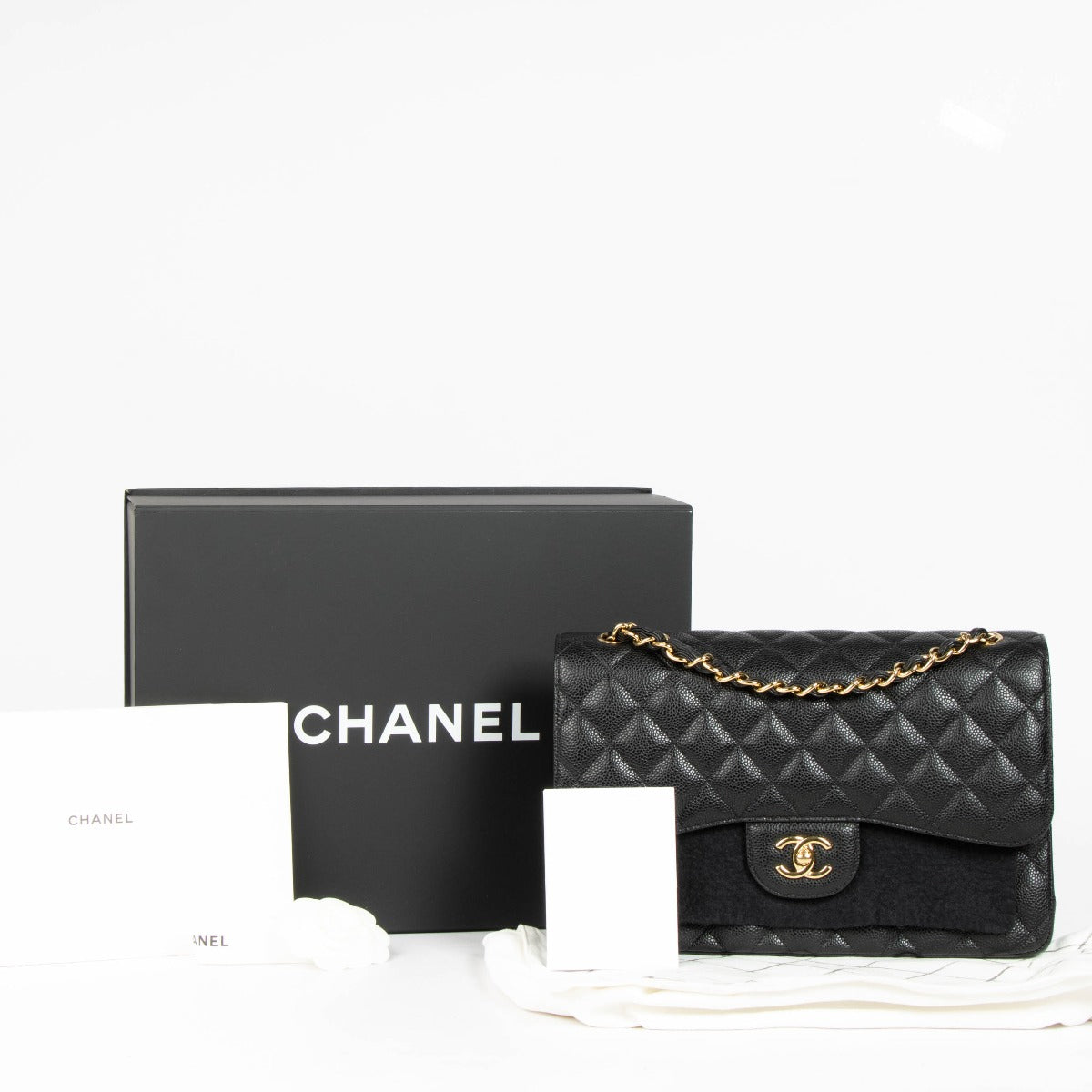 Authentic pre-loved Chanel Black Caviar Large / Jumbo Classic Bag on Labellov.com