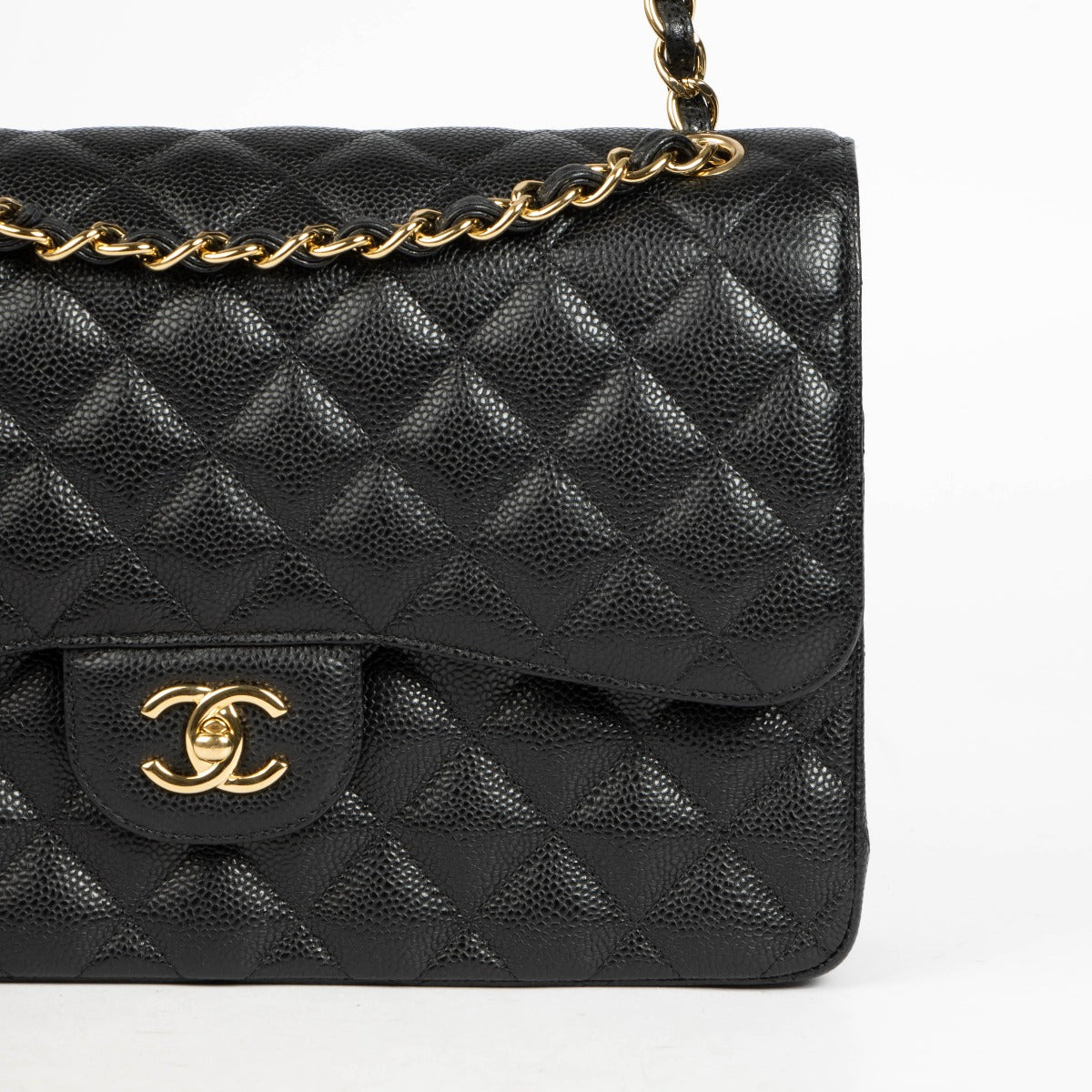 Authentic pre-loved Chanel Black Caviar Large / Jumbo Classic Bag on Labellov.com