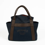 Hermès Bleu Navy Feu Toile Sac De Pasnage Groom Top Handle Bag for the best price at Labellov secondhand luxury