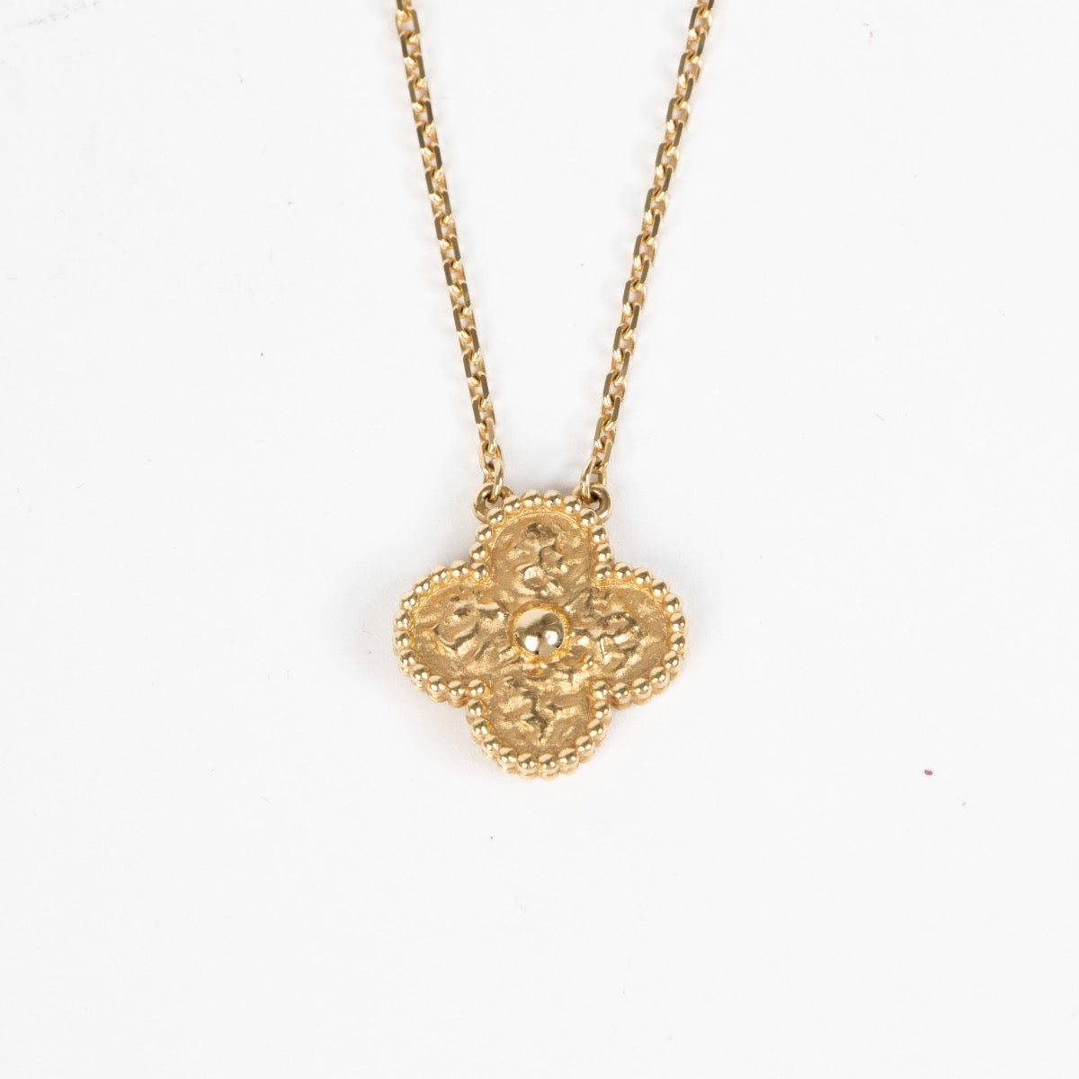 Shop this 100% authentic Van Cleef & Arpels Vintage Alhambra Hammered Yellow Gold Necklace at Labellov.com