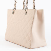 Authentic pre-loved Chanel Pale Pink Grand Shopping Tote Bag on Labellov.com