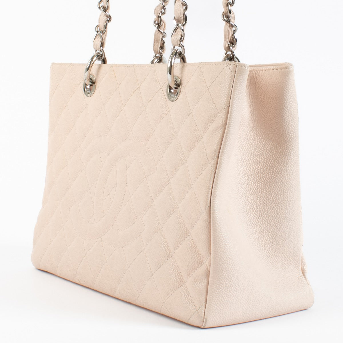 Authentic pre-loved Chanel Pale Pink Grand Shopping Tote Bag on Labellov.com