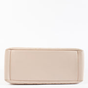 Authentic pre-loved Chanel Pale Pink Grand Shopping Tote Bag on Labellov.com