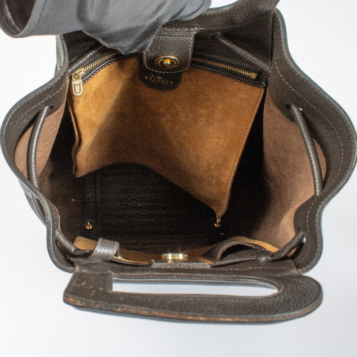 Delvaux Brown Leather Bag with woven front panel, gold-tone hardware and D-shaped handles at Labellov.com