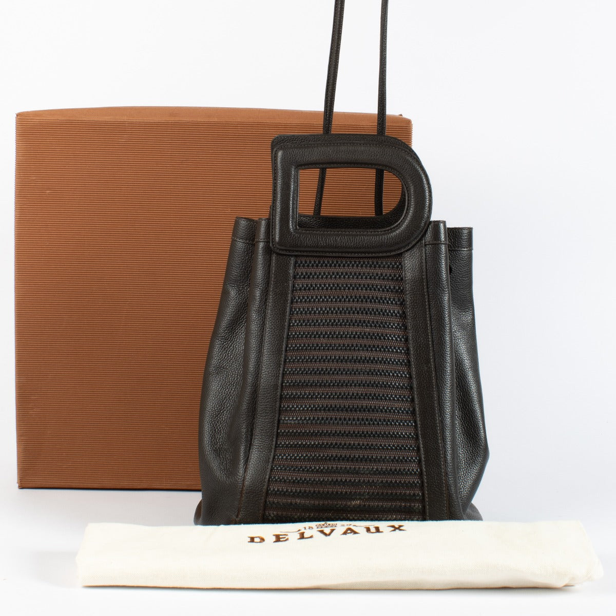 Delvaux Brown Leather Bag with woven front panel, gold-tone hardware and D-shaped handles at Labellov.com