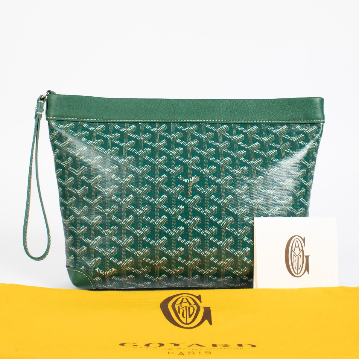 Authentic Goyard Saint Louis green Goyardine clutch in very good condition at Labellov.com.