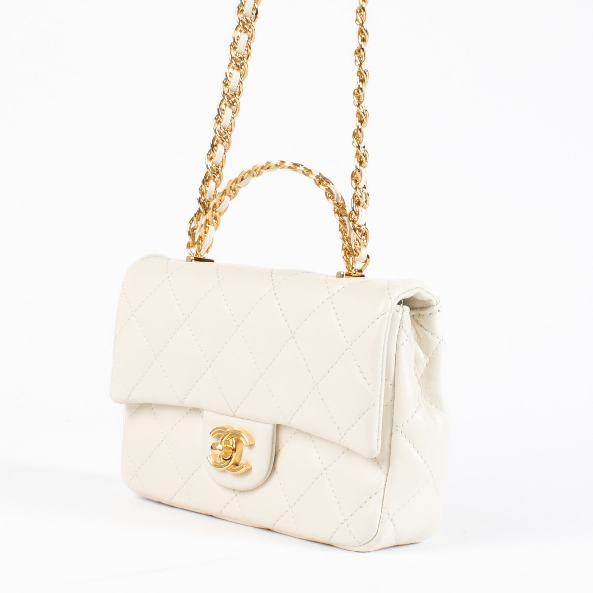 shop 100% authentic second hand Chanel Off White Quilted Lambskin Mini Top Handle Bag on Labellov.com