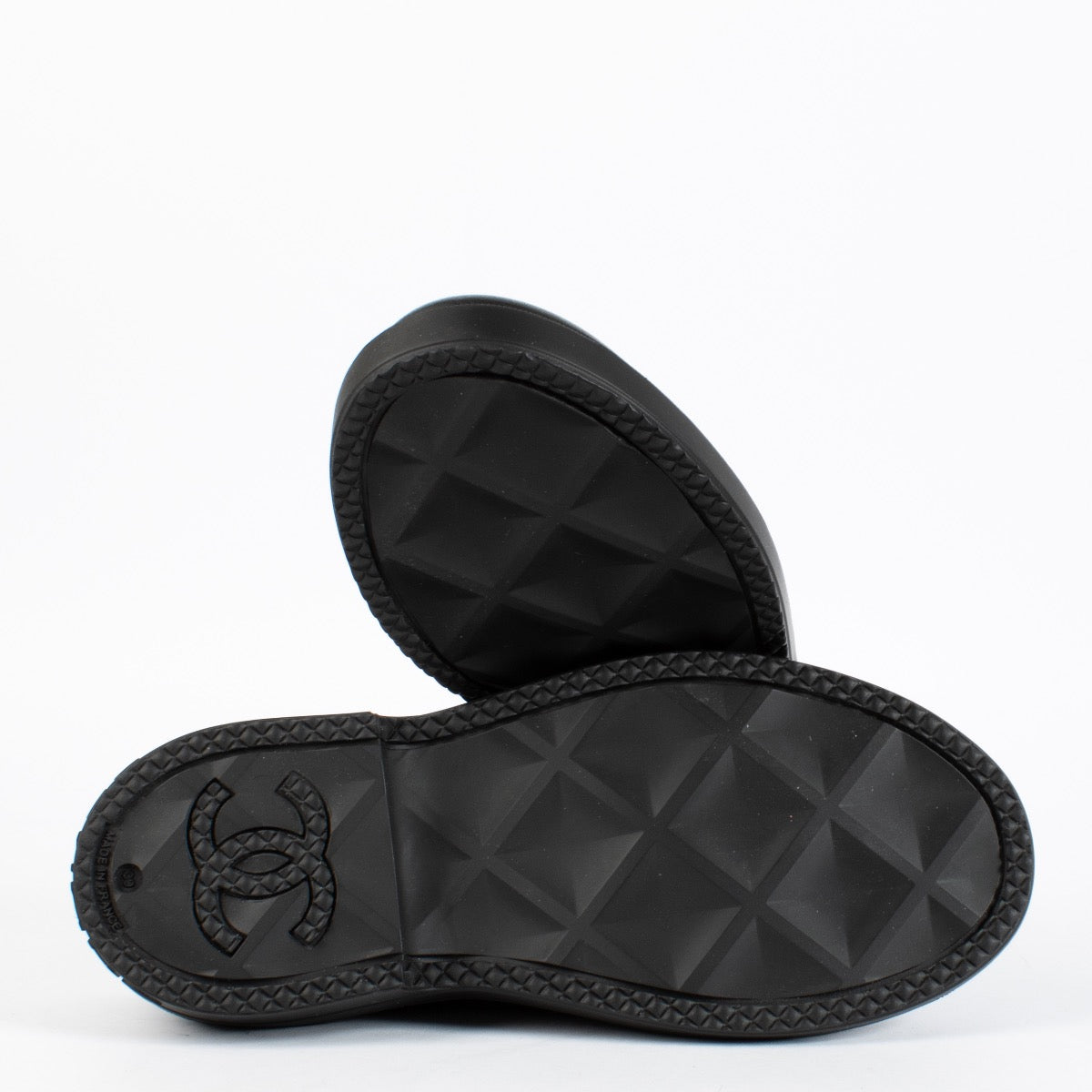 Authentic pre-loved Chanel Black Coco Mark Rubber Slip-On Shoes — Size 39 on Labellov.com