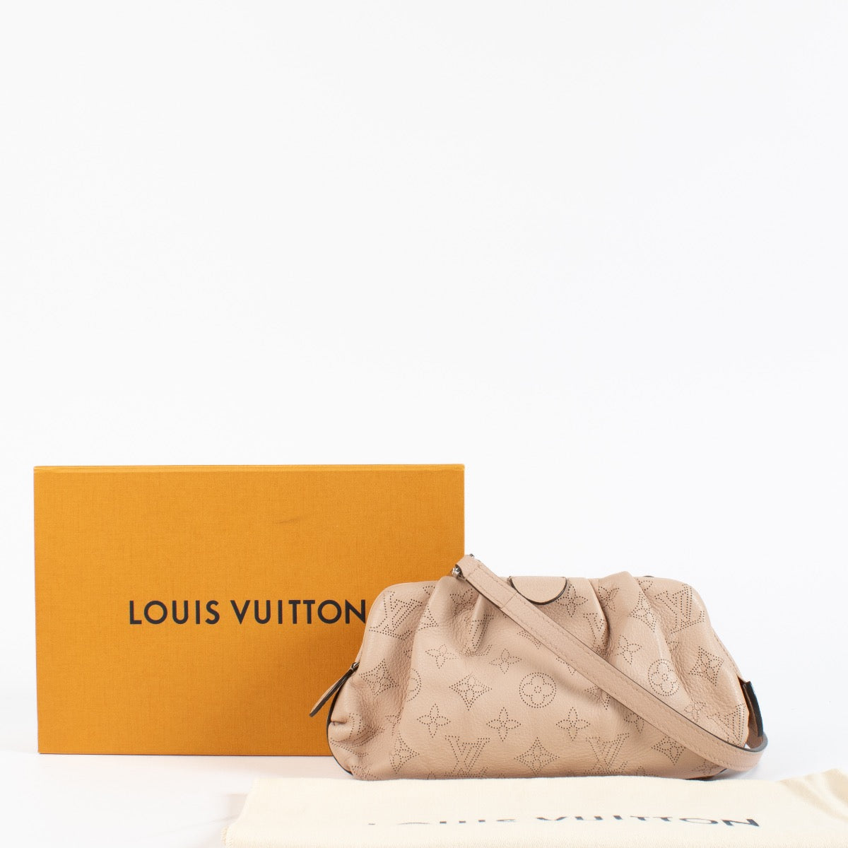 shop 100% authentic second hand Louis Vuitton Magnolia Mahina Perforated Scala Mini Pouch on Labellov.com