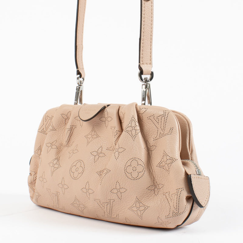 shop 100% authentic second hand Louis Vuitton Magnolia Mahina Perforated Scala Mini Pouch on Labellov.com