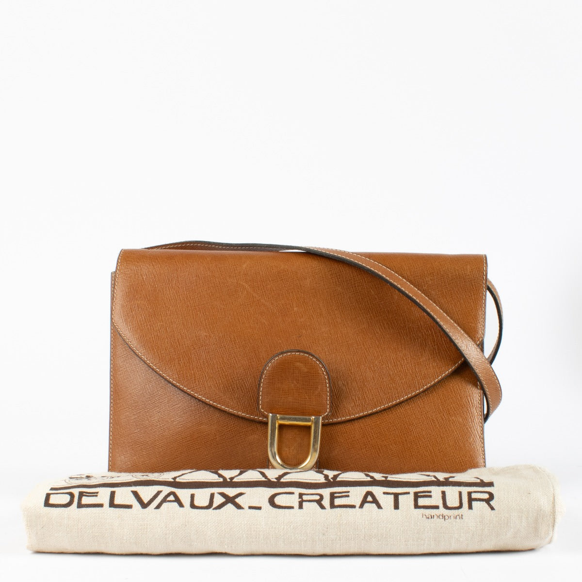 Authentic preloved Delvaux Camel Gué Crossbody Bag on Labellov.com