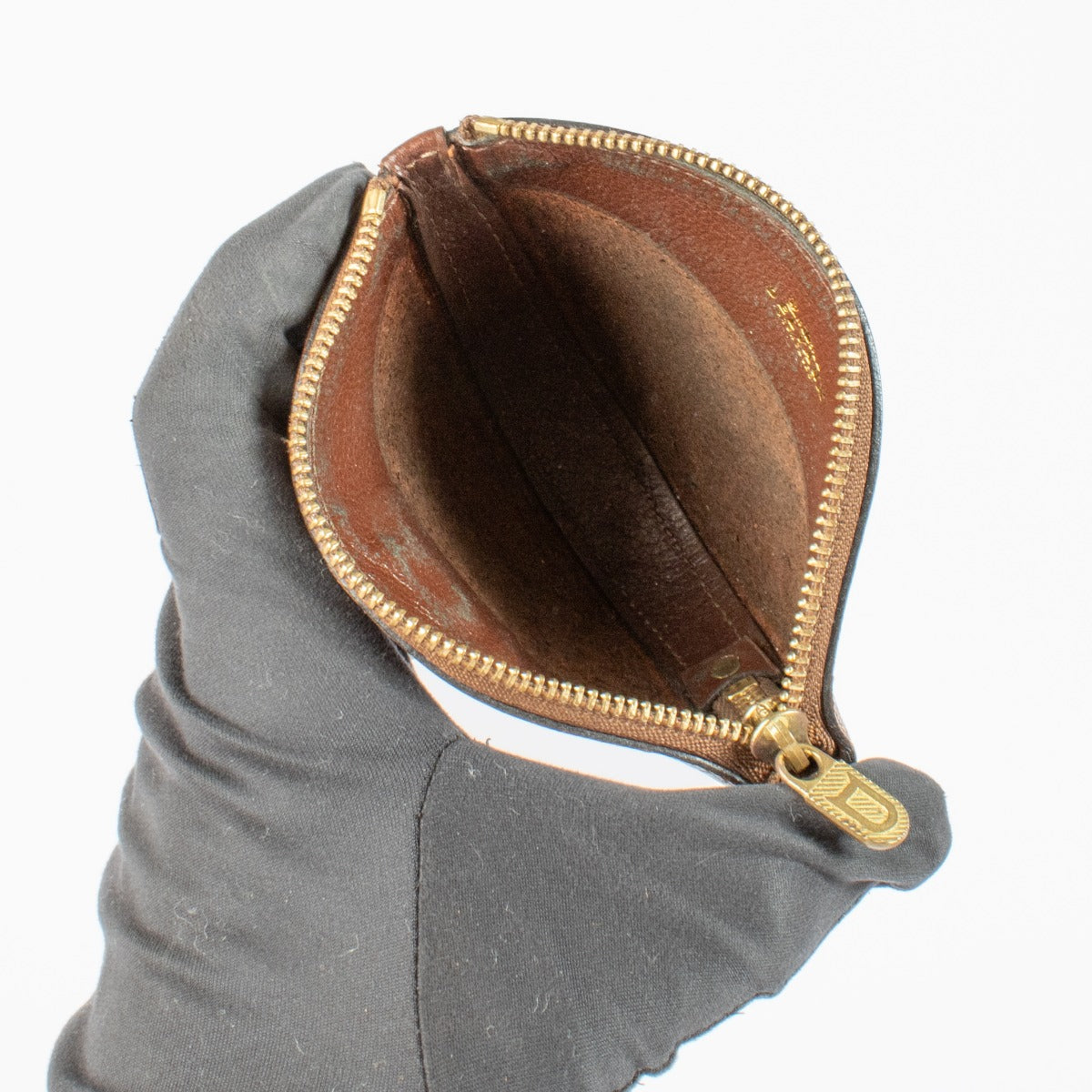 Authentic pre-loved Delvaux Brown Peche Coin Purse on Labellov.com