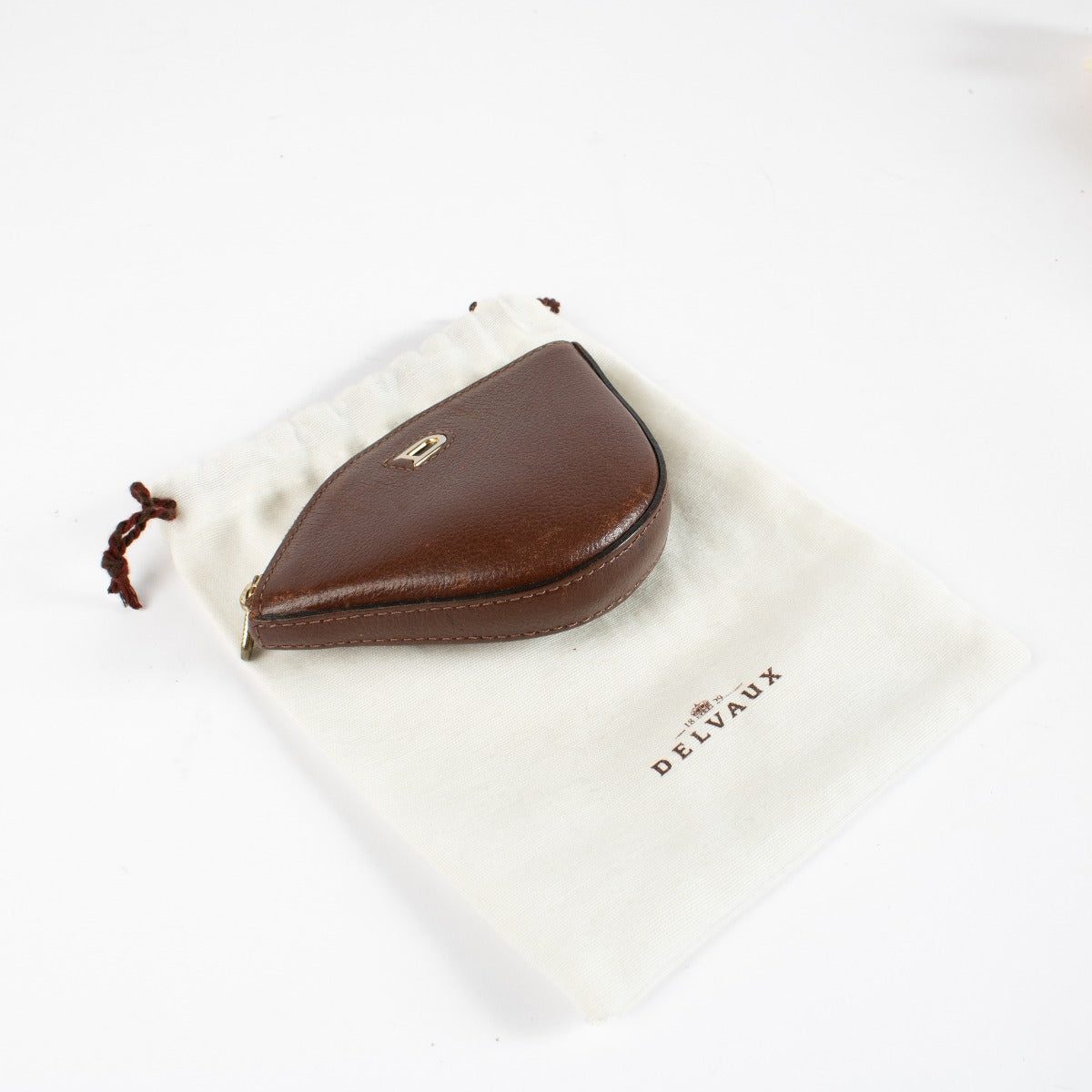 Authentic pre-loved Delvaux Brown Peche Coin Purse on Labellov.com