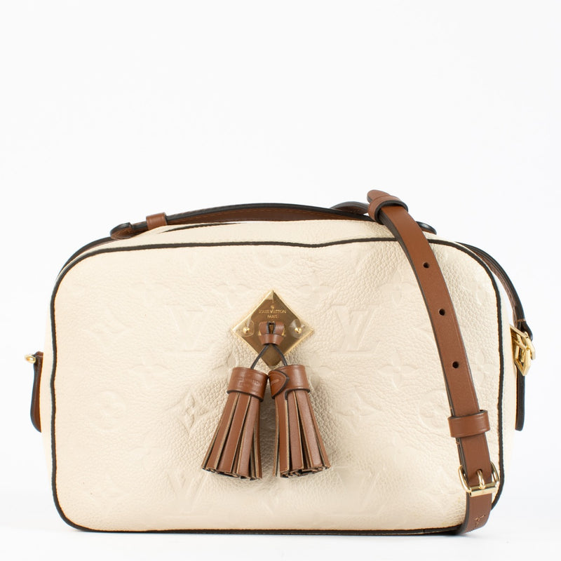 Authentic pre-loved Louis Vuitton Cream Monogram Empreinte Saintonge Bag on Labellov.com