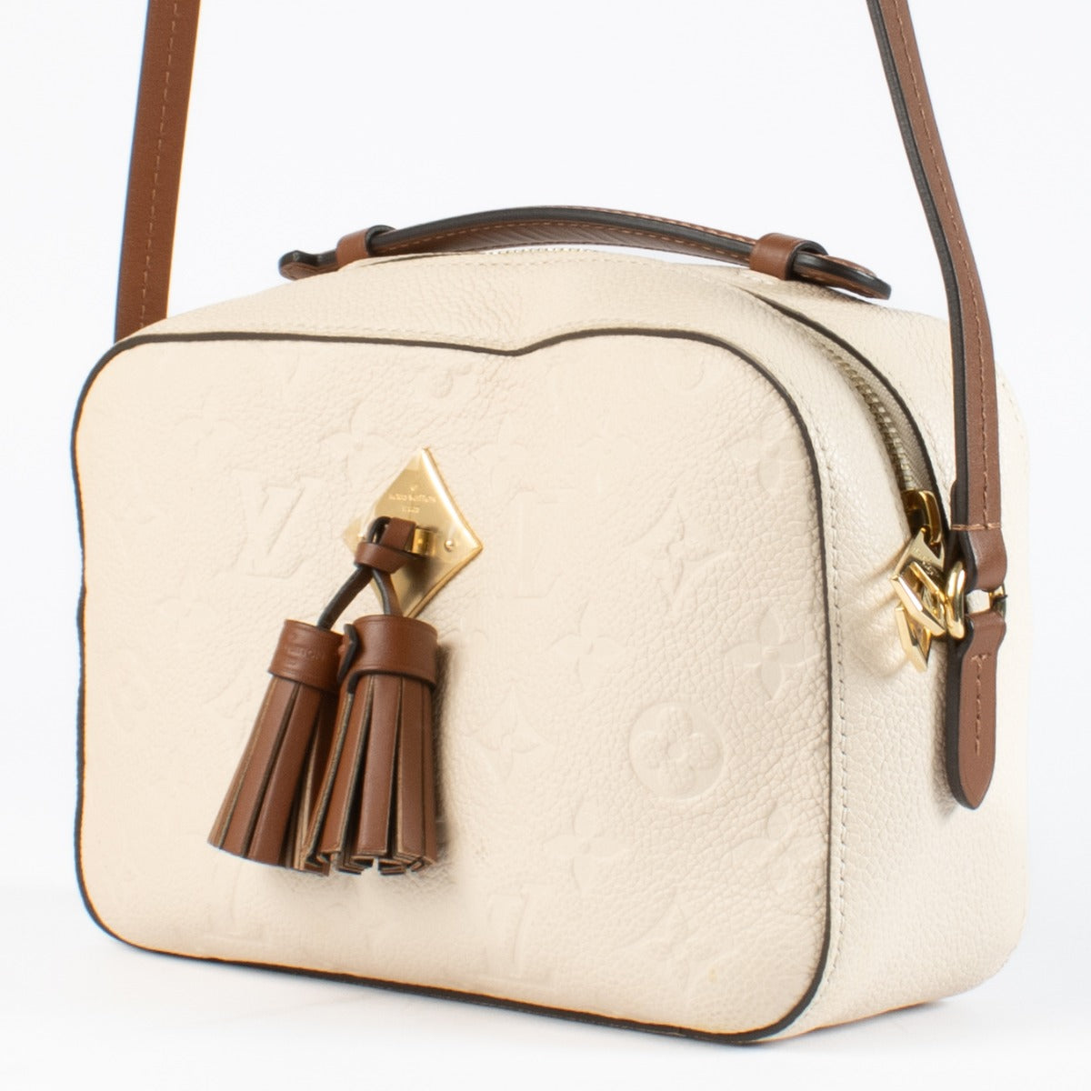 Authentic pre-loved Louis Vuitton Cream Monogram Empreinte Saintonge Bag on Labellov.com