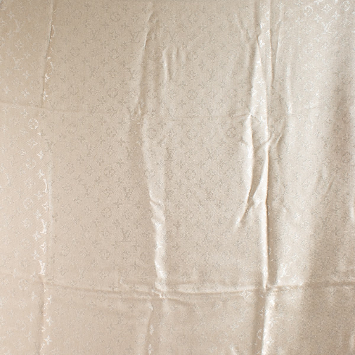 Authentic pre-loved Louis Vuitton Beige Monogram Classic Shawl on Labellov.com