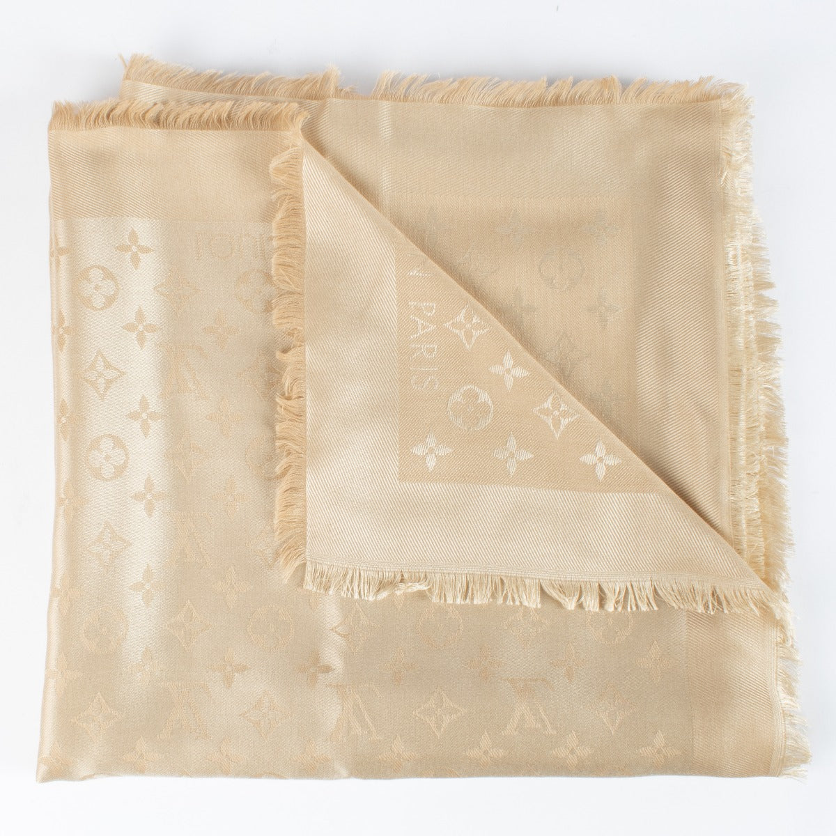 Authentic pre-loved Louis Vuitton Beige Monogram Classic Shawl on Labellov.com