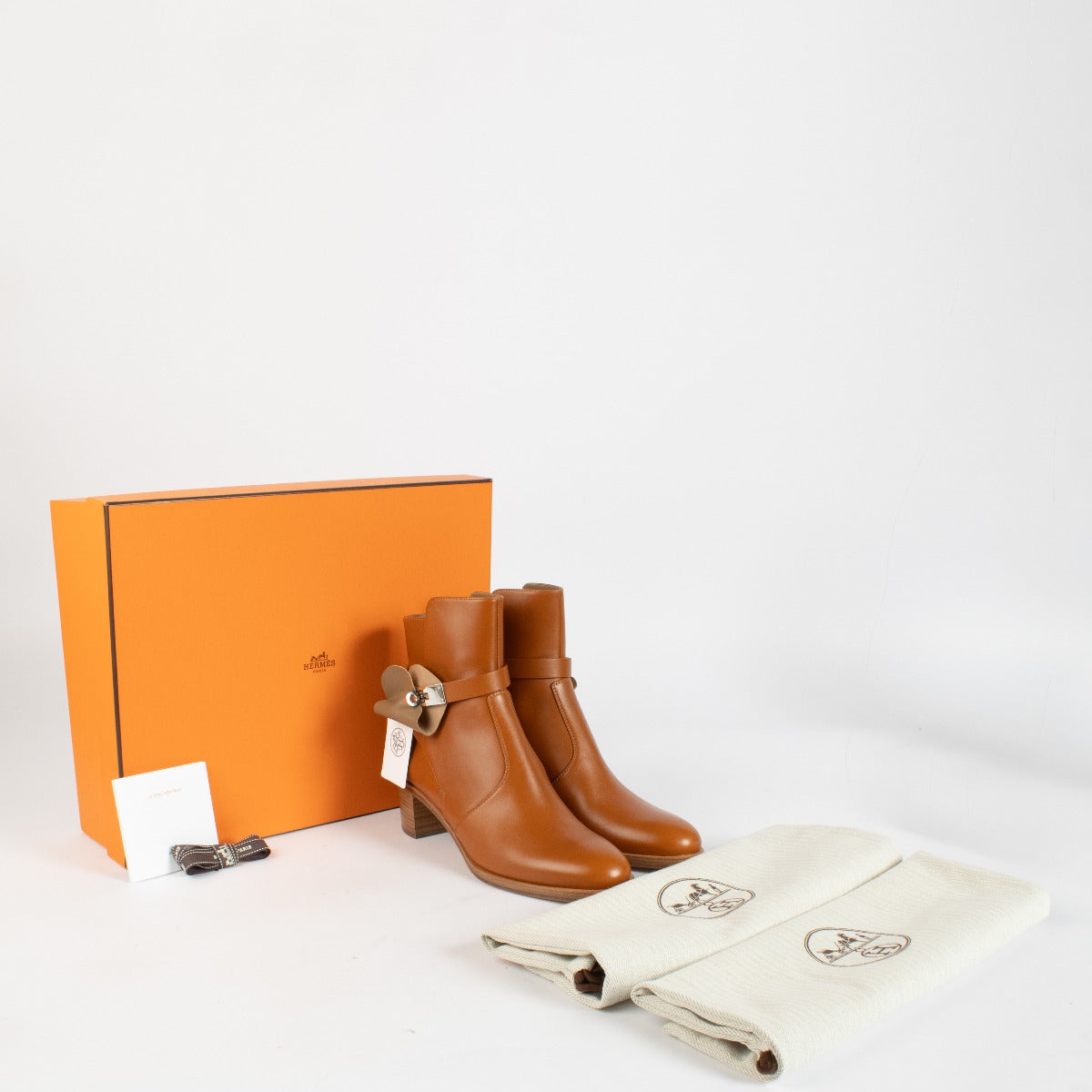 Authentic Hermès Frenchie 50 Ankle Boots in gold calfskin leather size 37 at Labellov.com
