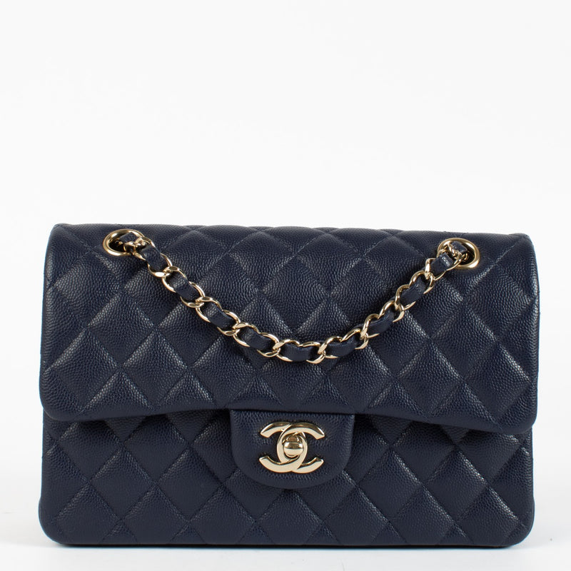 Authentic pre-loved Chanel Navy Blue Caviar Small Classic Flap Bag on Labellov.com