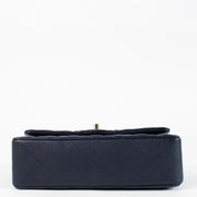 Authentic pre-loved Chanel Navy Blue Caviar Small Classic Flap Bag on Labellov.com