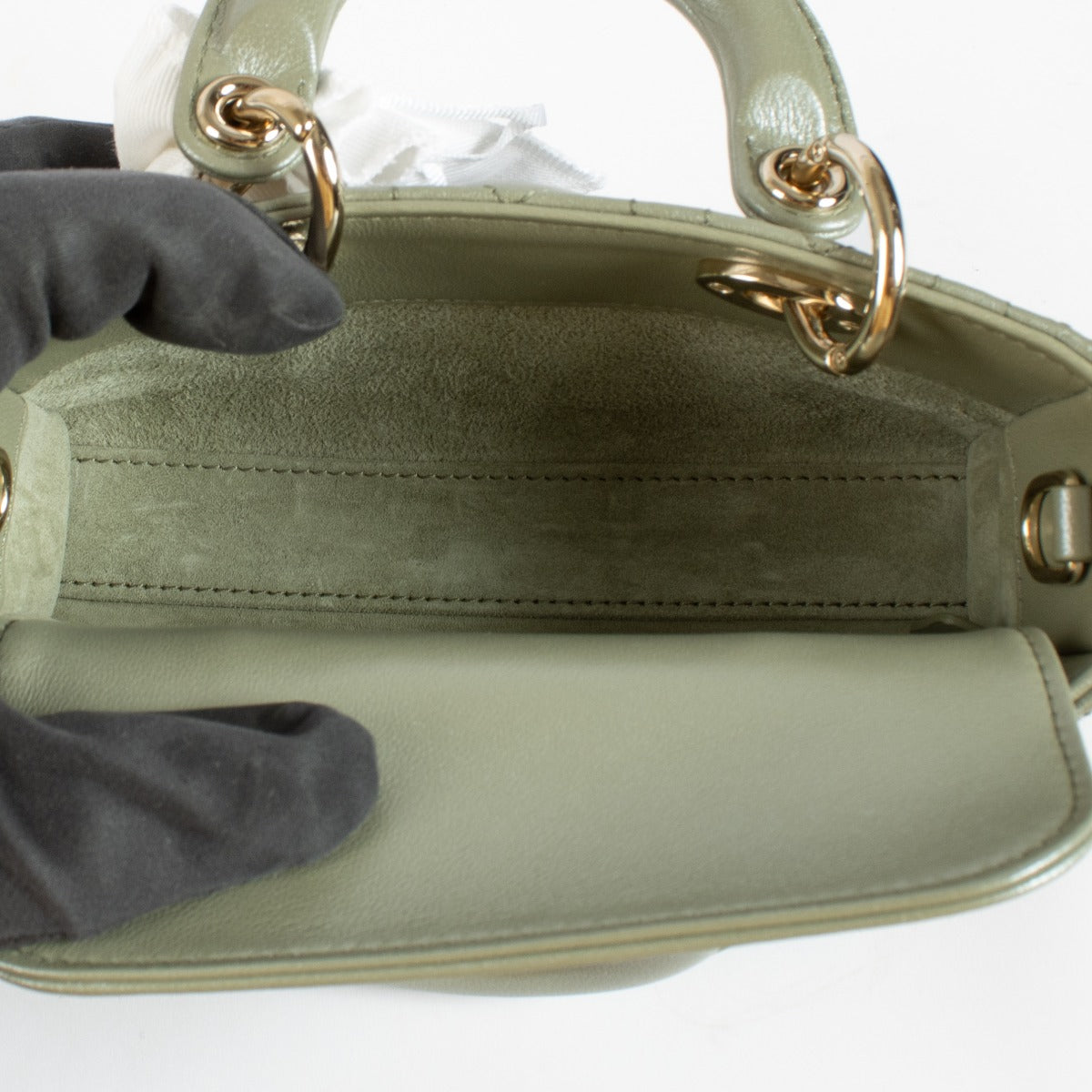 Dior Lady D-Joy bag in pastel Peyote green lambskin with gold hardware. A refined East-West Dior icon in excellent pre-loved condition.