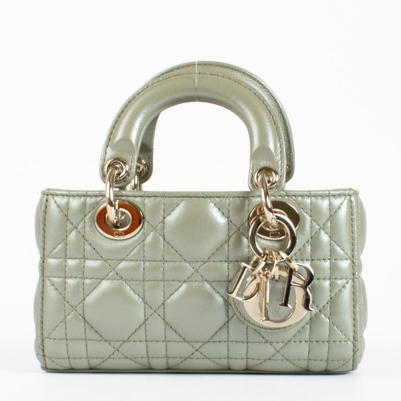 Dior Lady D-Joy bag in pastel Peyote green lambskin with gold hardware. A refined East-West Dior icon in excellent pre-loved condition.
