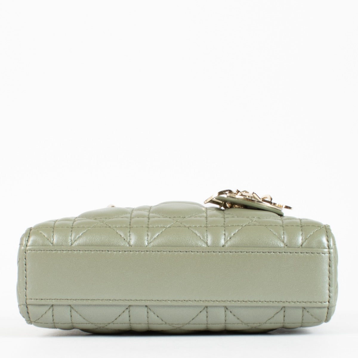 Dior Lady D-Joy bag in pastel Peyote green lambskin with gold hardware. A refined East-West Dior icon in excellent pre-loved condition.