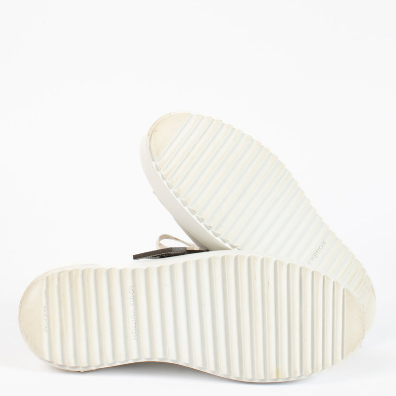 Authentic pre-loved Louis Vuitton White Time Out Sneakers – Size 37 on Labellov.com