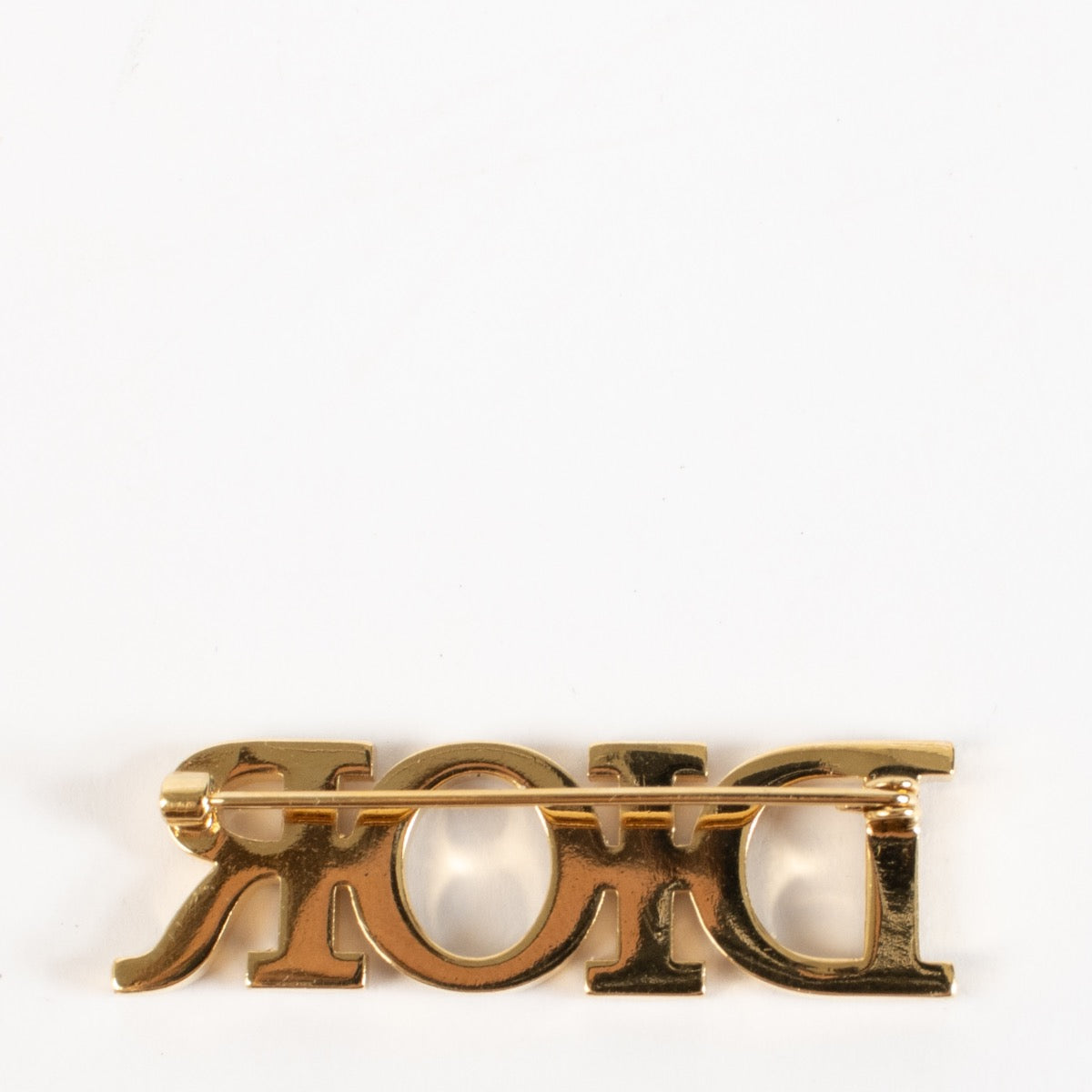 shop 100% authentic second hand Christian Dior Gold Crystal Dio(r)evolution Brooch on Labellov.com