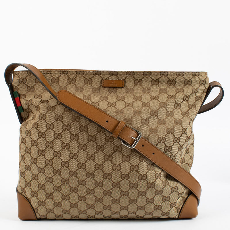 Authentic pre-loved Gucci Canvas GG Monogram Messenger Bag on Labellov.com