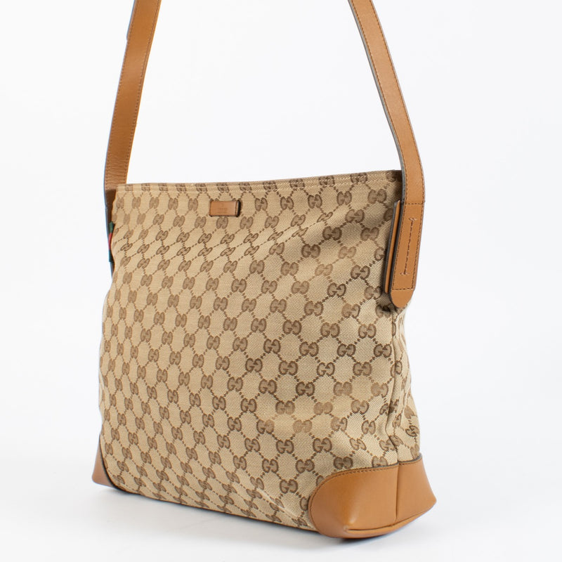 Authentic pre-loved Gucci Canvas GG Monogram Messenger Bag on Labellov.com