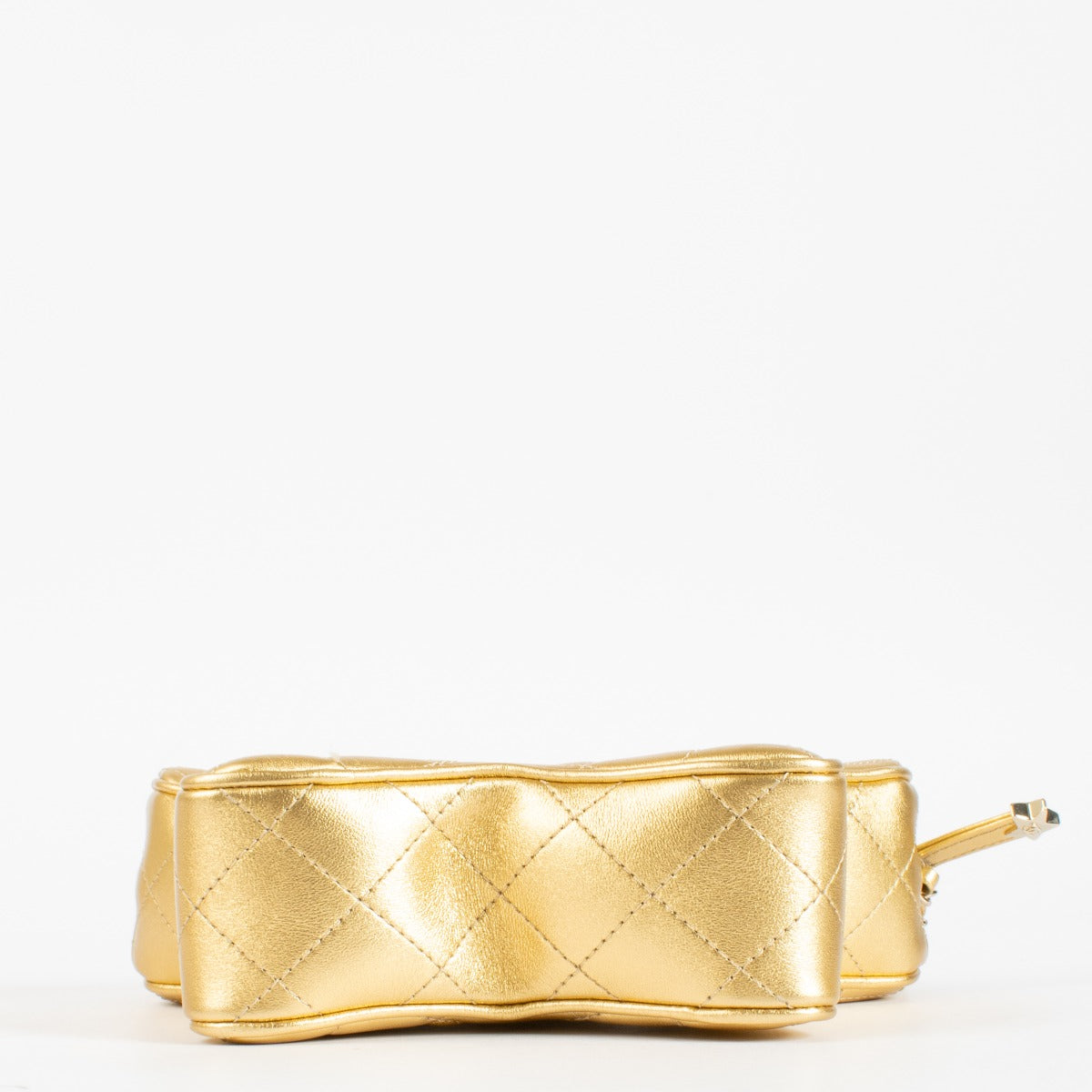 Authentic pre-loved Chanel Metallic Gold Leather Star Bag on Labellov.com