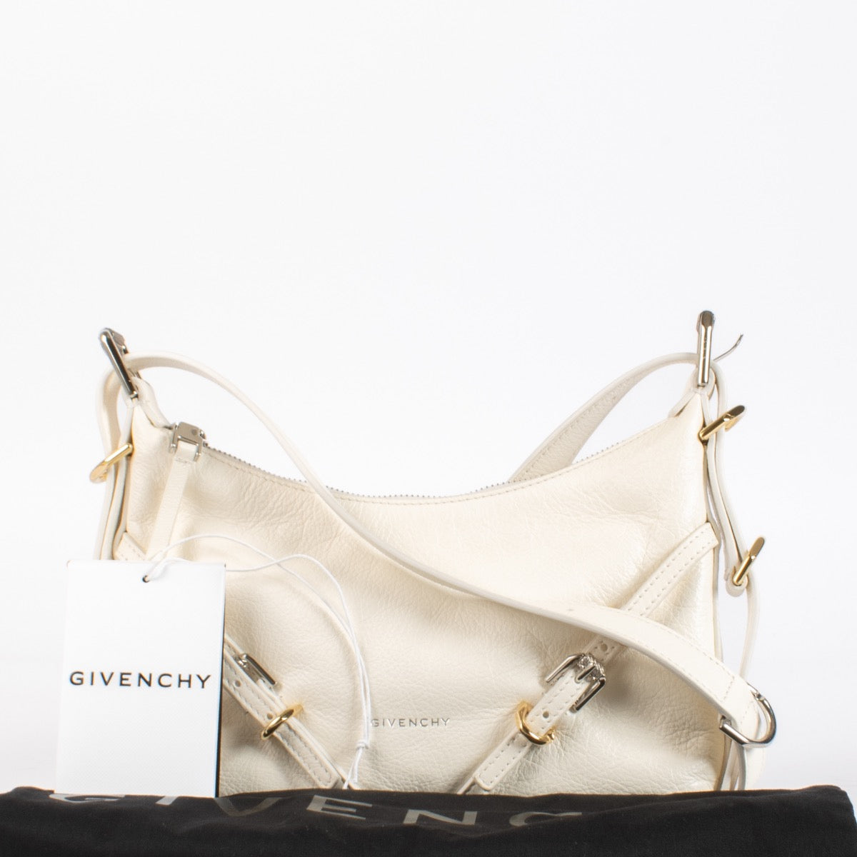 Authentic pre-loved Givenchy Ivory Mini Voyou Bag on Labellov.com