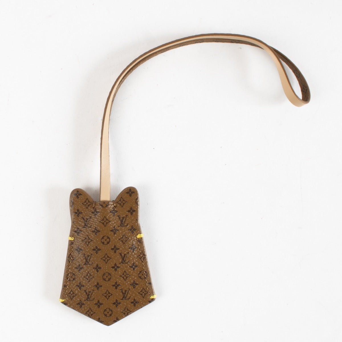 Authentic Preloved Louis Vuitton Dog Leather Charm on Labellov.com
