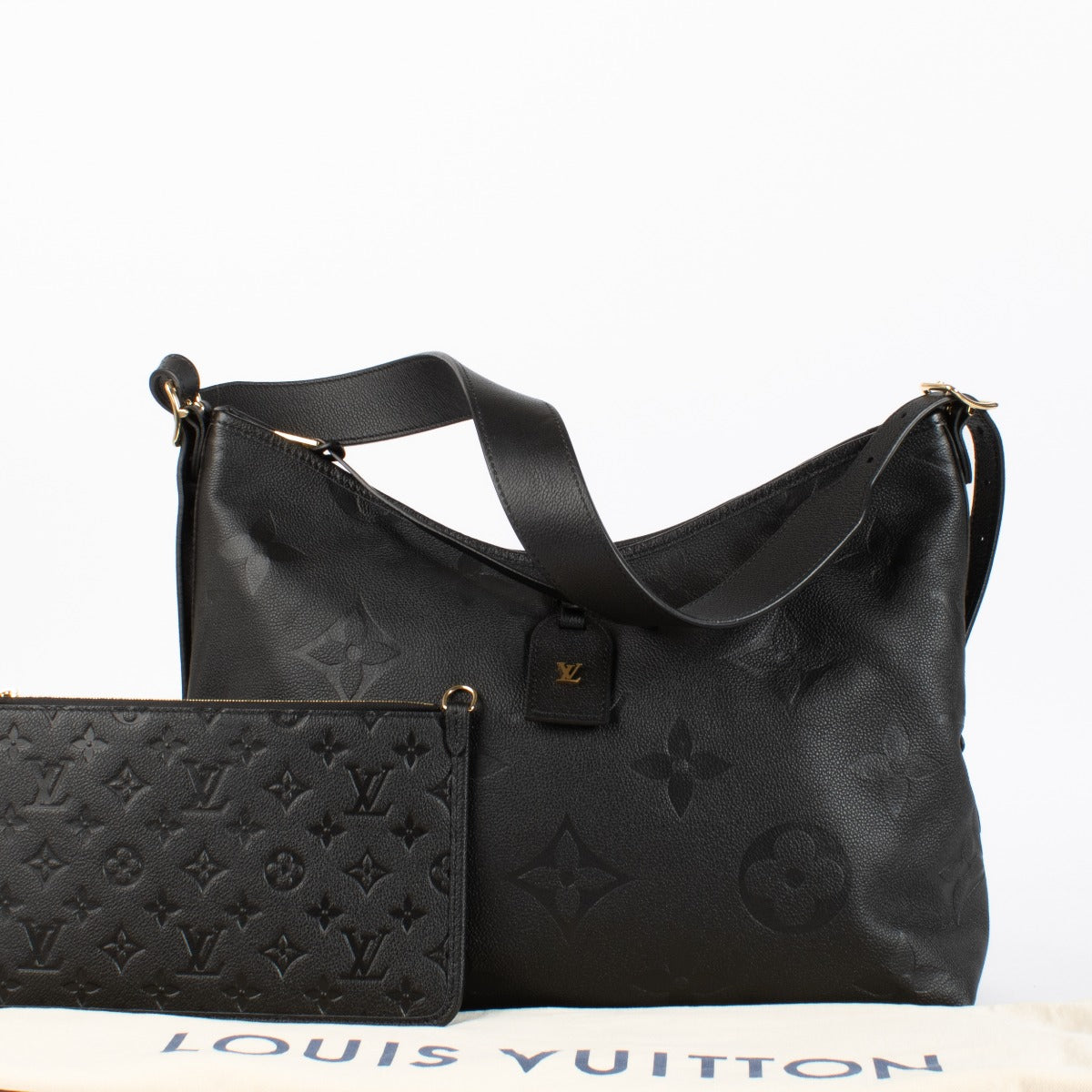 Louis Vuitton CarryAll “Carall” in black Monogram Empreinte leather — a sleek, versatile shoulder hobo bag in excellent pre-loved condition.