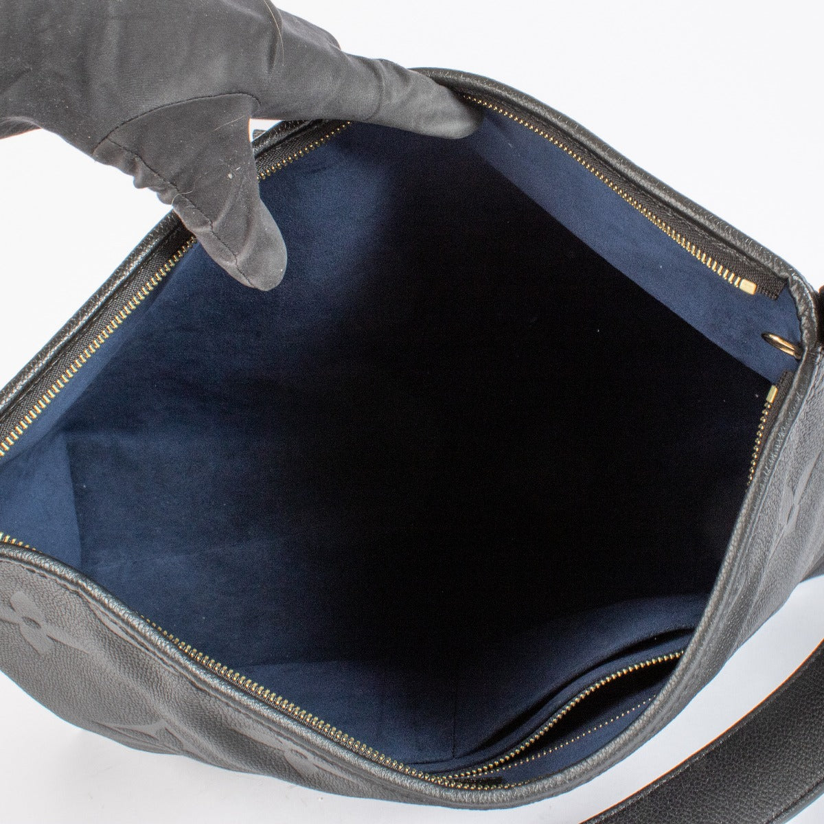 Louis Vuitton CarryAll “Carall” in black Monogram Empreinte leather — a sleek, versatile shoulder hobo bag in excellent pre-loved condition.