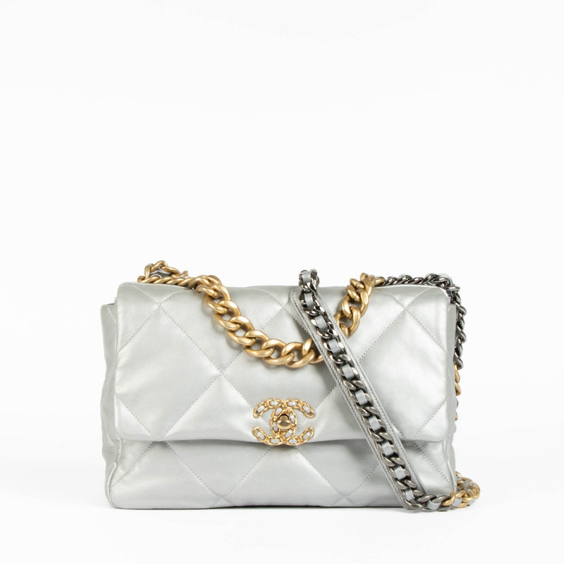 Shop this authentic Chanel Silver Lambskin Large Chanel 19 Bag pre-loved on Labellov.com