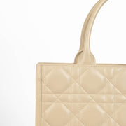 Christian Dior Book Tote sand embroidered canvas handbag, luxury designer tote with Dior logo pattern, neutral structured everyday bag for travel and city use