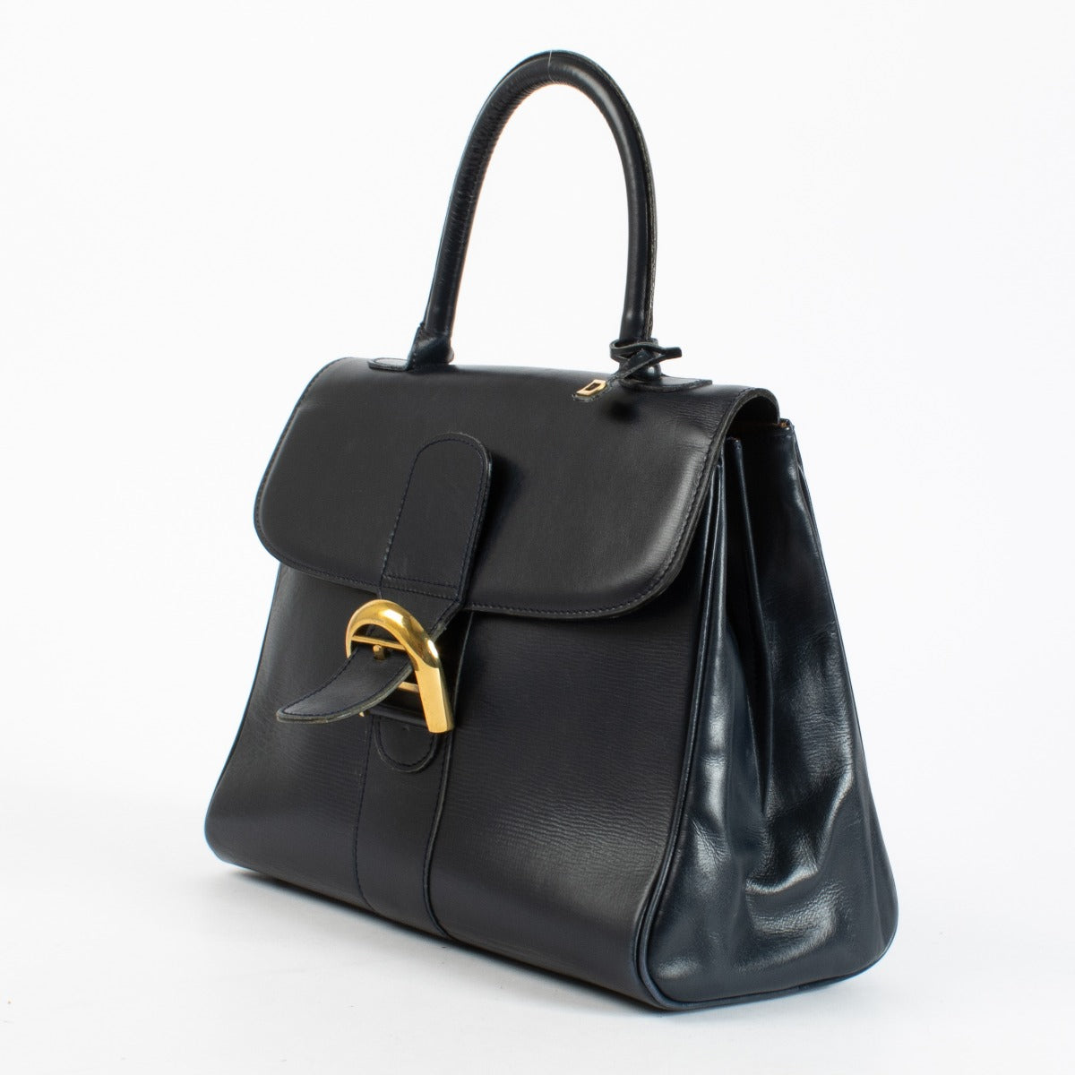 Delvaux 1960s Marine Blue Leather Brillant MM in smooth box leather with gold-tone hardware, available at Labellov.com