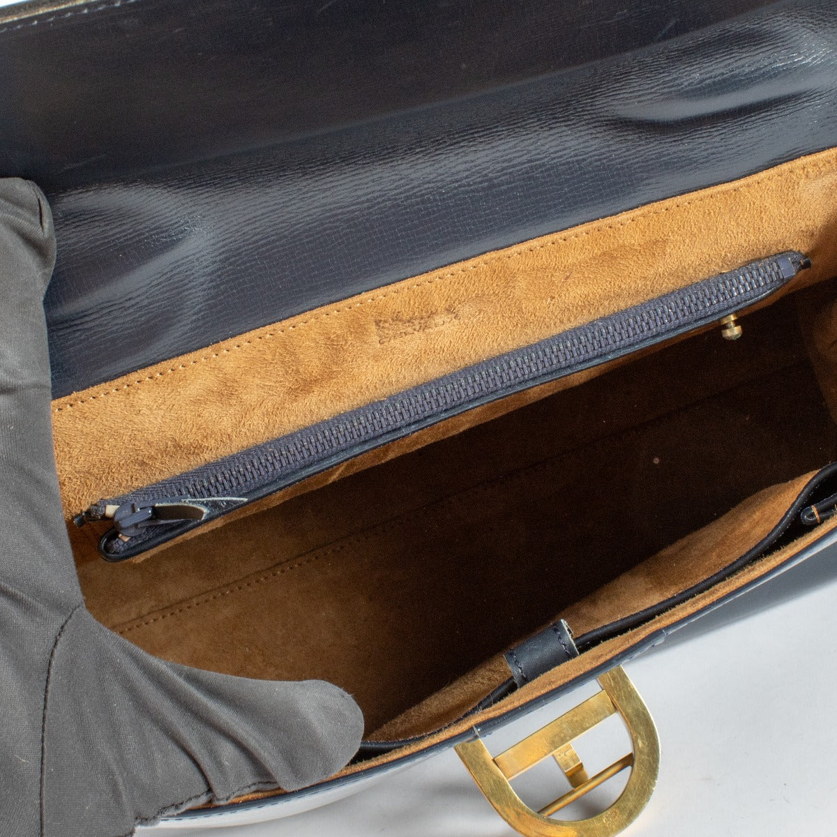 Delvaux 1960s Marine Blue Leather Brillant MM in smooth box leather with gold-tone hardware, available at Labellov.com