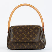 Authentic pre-loved Louis Vuitton Monogram Looping PM on Labellov.com