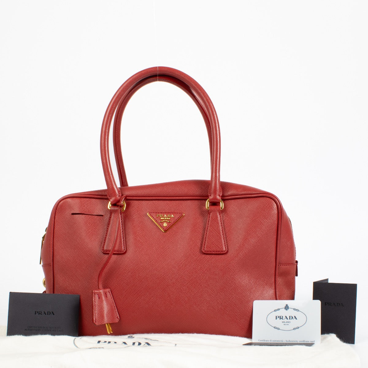 authentic preloved Prada Red Saffiano Lux Bowling Bag on Labellov.com