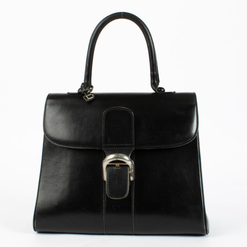 Delvaux Brillant MM in black Box Calf leather with silver buckle and soft vintage patina at Labellov.com