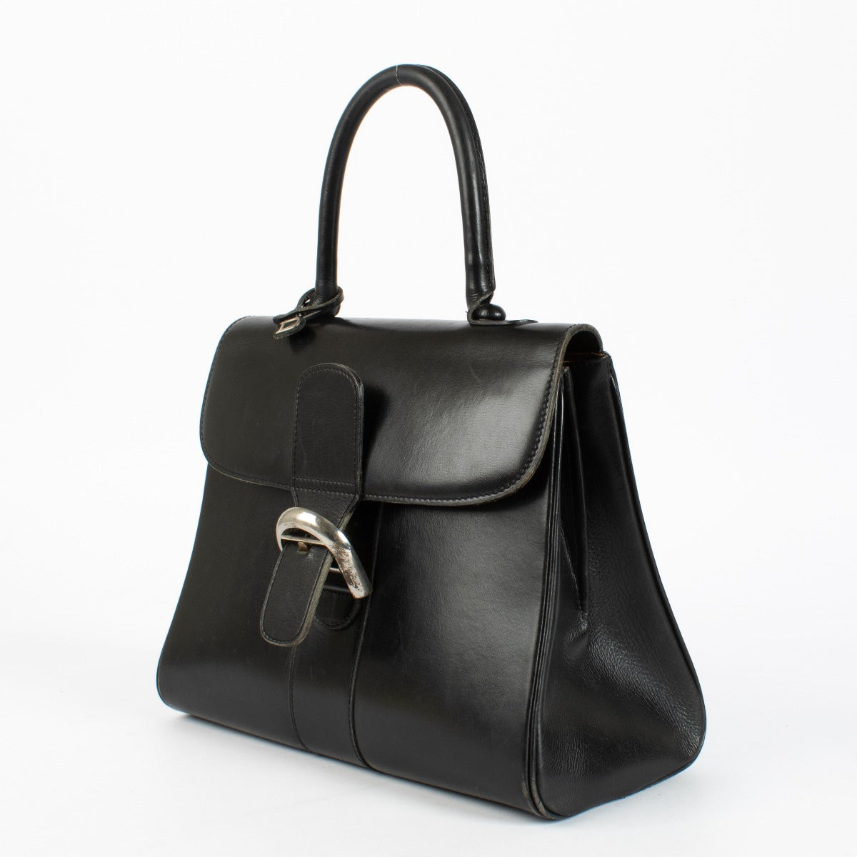 Delvaux Brillant MM in black Box Calf leather with silver buckle and soft vintage patina at Labellov.com