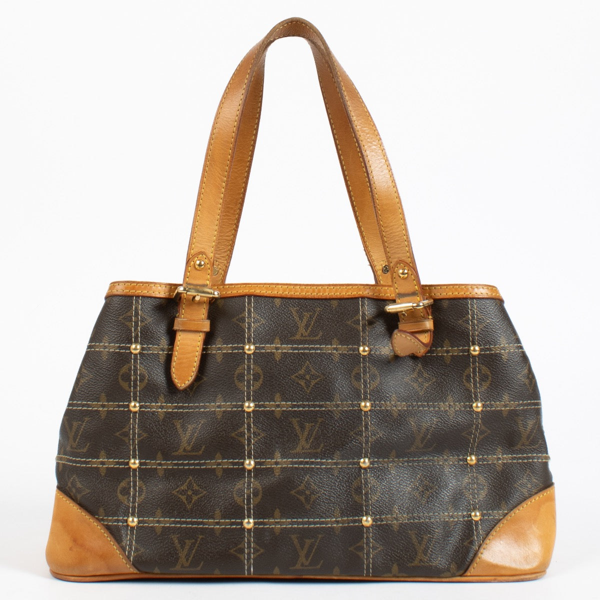 Louis Vuitton Monogram Rivets Handbag with gold rivet detailing and natural leather handles at Labellov.com