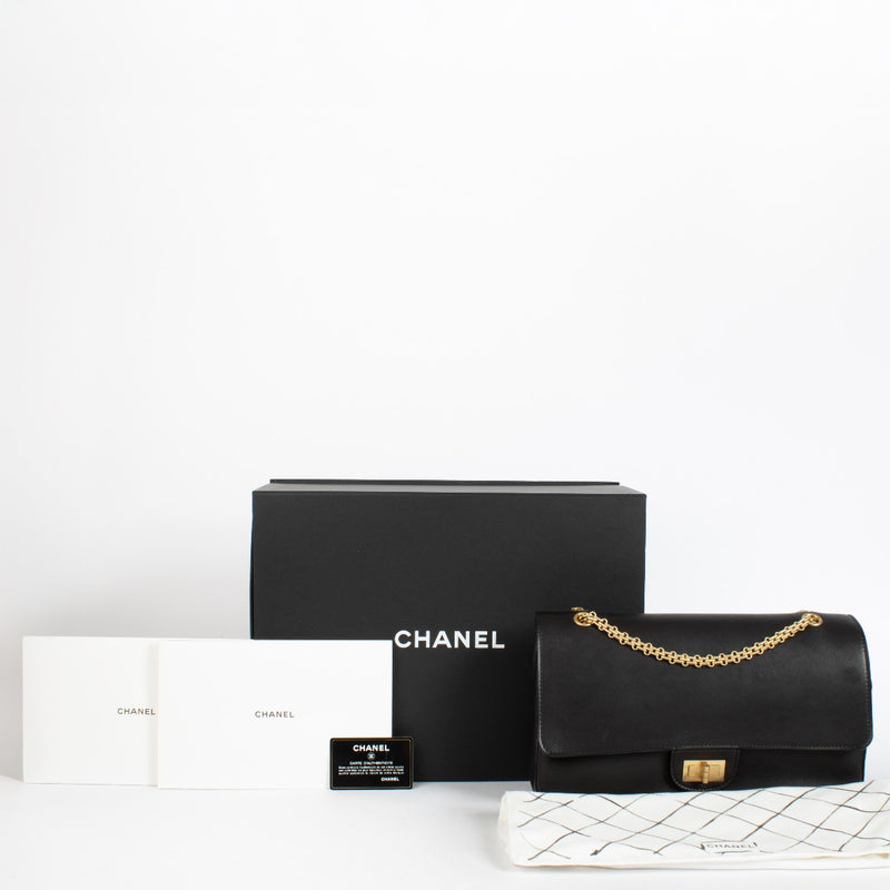 Chanel Paris–Hamburg 2.55 Maxi bag in black calfskin with gold hardware at Labellov.com