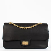 Chanel Paris–Hamburg 2.55 Maxi bag in black calfskin with gold hardware at Labellov.com