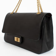 Chanel Paris–Hamburg 2.55 Maxi bag in black calfskin with gold hardware at Labellov.com