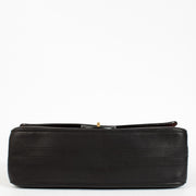 Chanel Paris–Hamburg 2.55 Maxi bag in black calfskin with gold hardware at Labellov.com