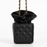 Authentic pre-loved Chanel Black Lambskin Micro Box Bag on Labellov.com